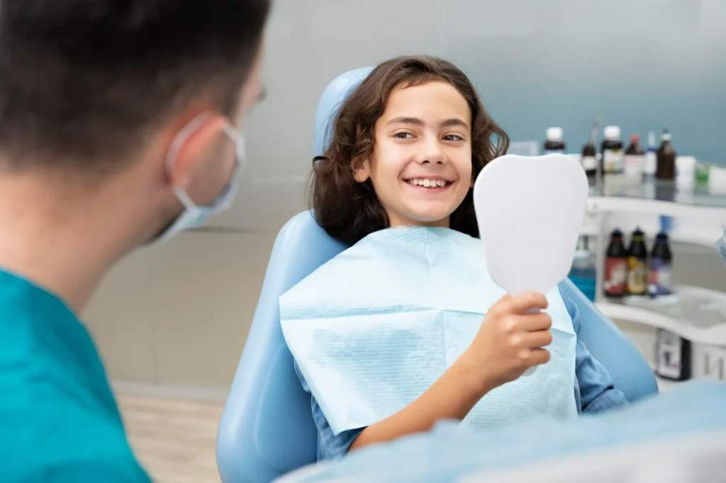 Healthy smile after preventive dental cleaning for kids