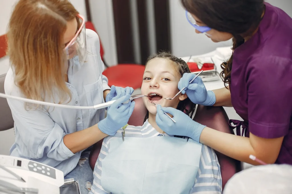 What happens during a dental cleaning for kids