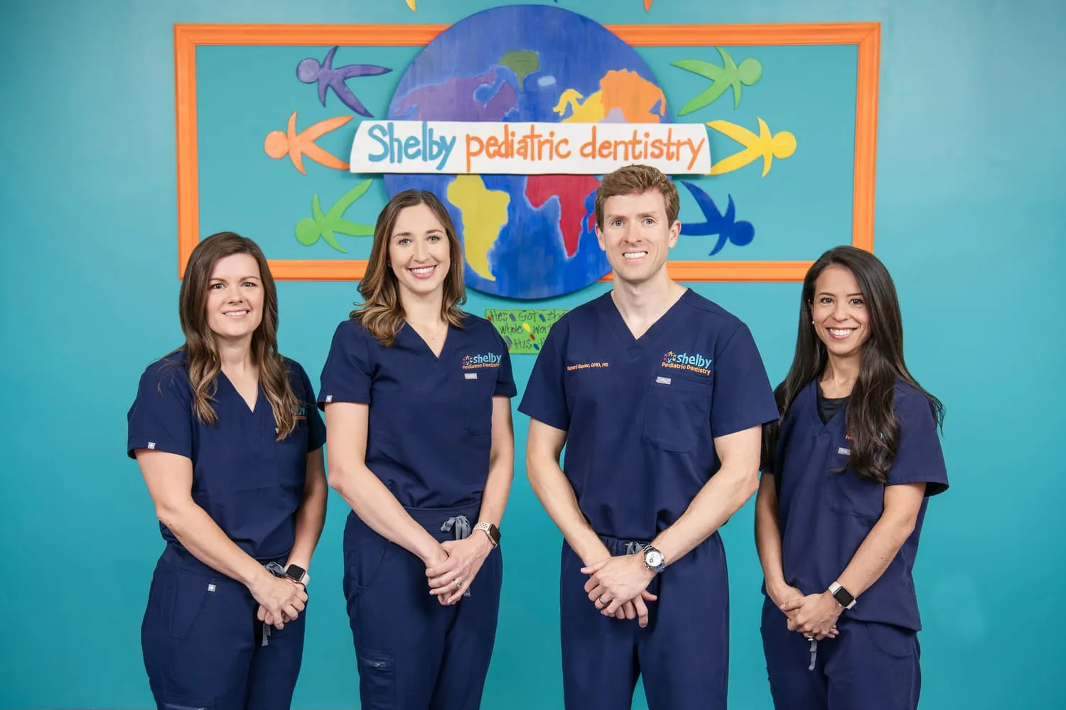 Group image of doctors at Shelby Pediatric Dentistry.
